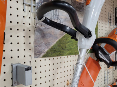 Power tool retail display secured by a Vise LC recoiler from RTF Global.