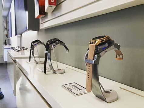 Smartwatches store display secured by an anti-theft device from RTF Global