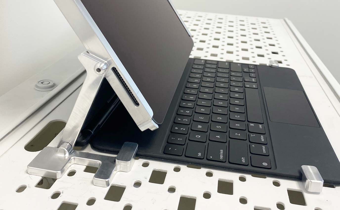 iPad and Magic Keyboard secured to display using anti-theft device from RTF Global