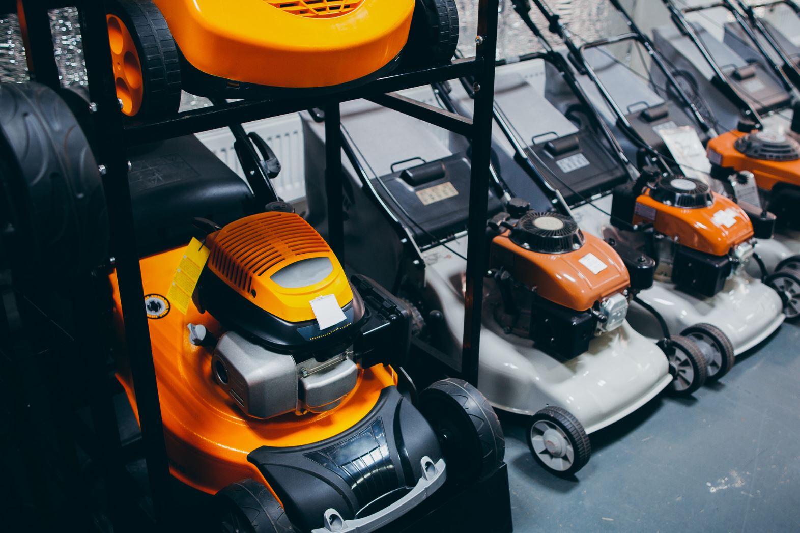 Lawnmowers secured in a hardware store by RTF Global security solutions.