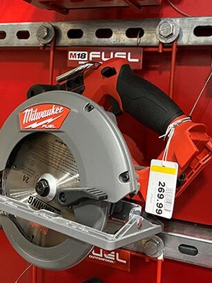 Power saw secured to retail display with recoiler from RTF Global
