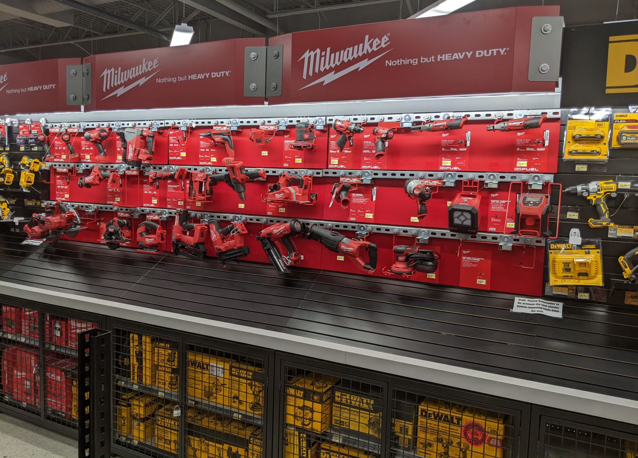 Hardware store inventory secured to retail displays by recoilers from RTF Global
