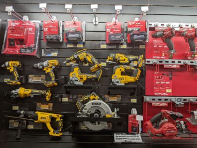 Power tools secured to a retail display in a hardware store by products from RTF Global
