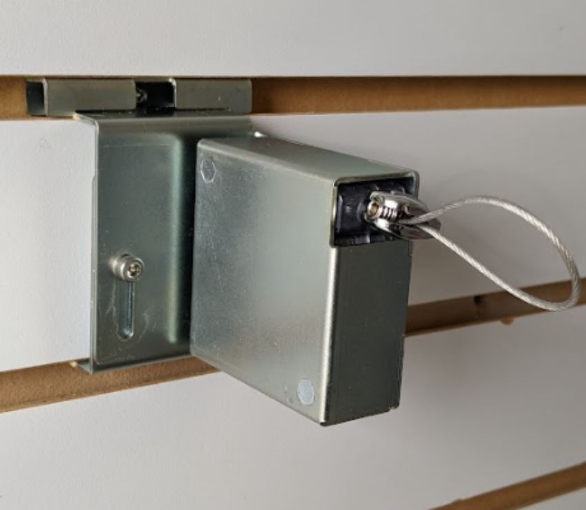 Security display recoiler for slat walls from RTF Global